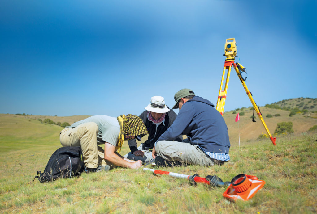 Pivotal members of the research team are WashU doctoral student Edward Henry (left), MA ’14; Taylor Hermes (center), AB ’07, a doctoral candidate at Kiel University in Germany; and Farhod Maksudov, who is Michael Frachetti’s Uzbekistani co-principal investigator. (Photo: Thomas Malkowicz)