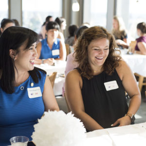 two women medical residents share a laugh