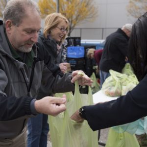 employees help at a food bank