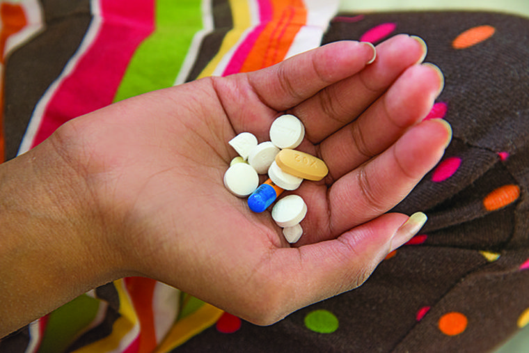 hand holding pills