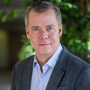 Chris Boerner, AB '93, in a garden