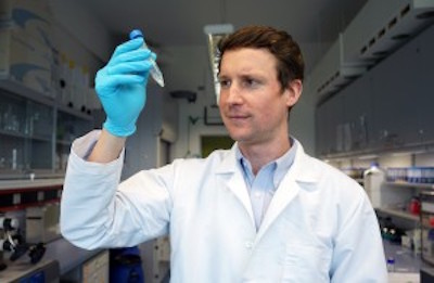 Archaeologist Taylor Hermes examines a sample in the isotopic analysis lab at Kiel University.