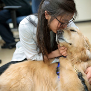 student with dog