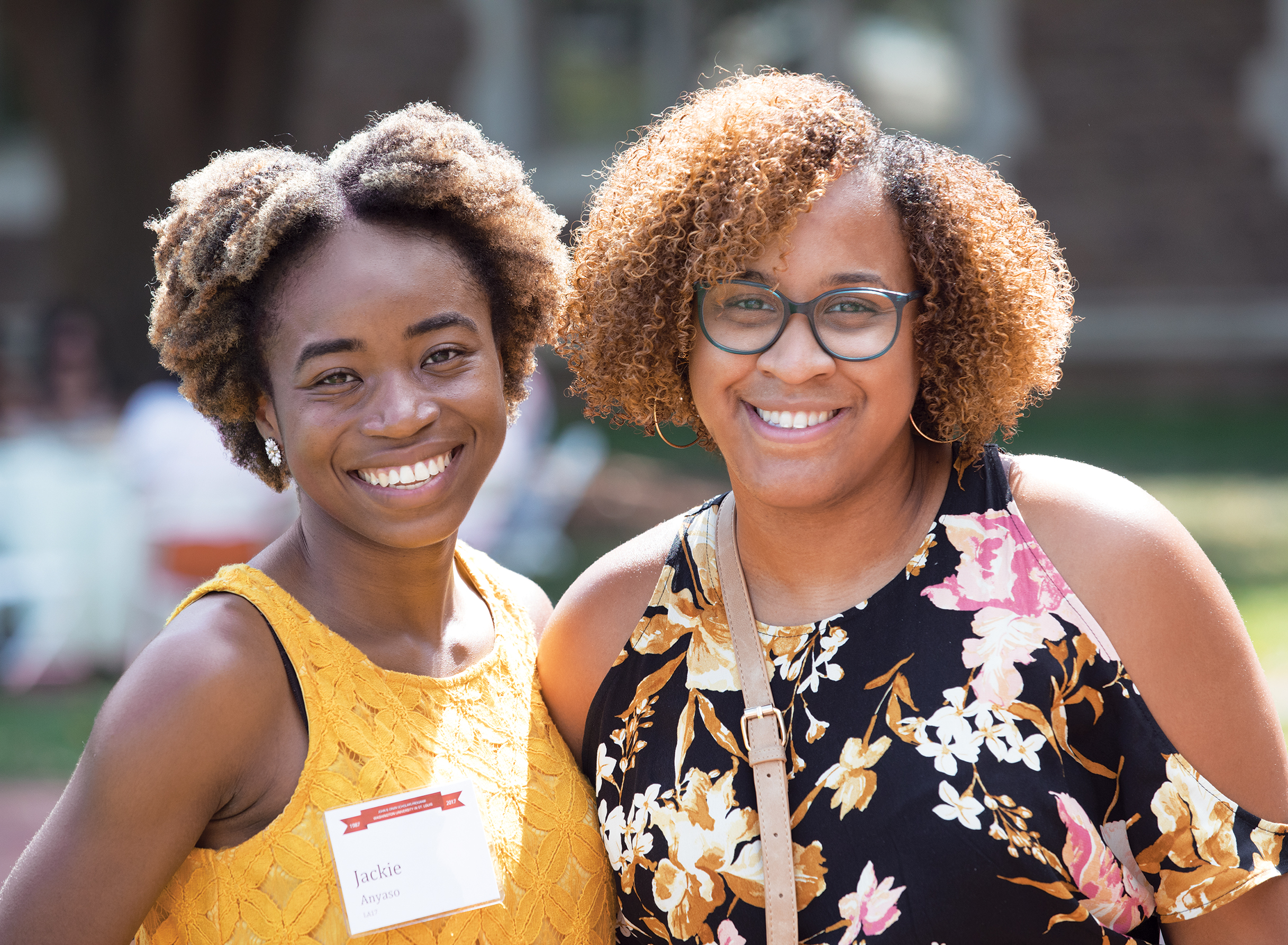 Jackie Anyaso (left), AB ’17, and ­Jordan Peters, AB ’14, a ­graduate student in ­soc­ial work at the Brown School, meet up during the Ervin Scholars Program’s 30th-­anniversary weekend. (Joe Angeles/WUSTL Photos)