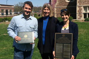 Anthropology students Ed Henry and Elissa Bullion (right) celebrate the receipt of a departmental service award named for former anthropology administrator Kathleen Clark (center).