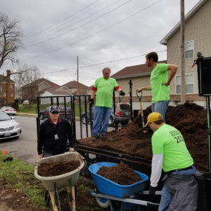 workers at neighborhood cleanup day