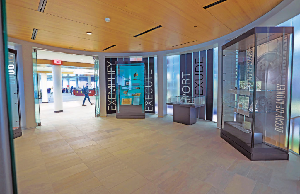 Level 1 of the Newman Tower of ­Collections and ­Exploration features displays curated by the Julian Edison Department of Special Collections. An expanded Whispers Café can be seen in the background. (James Byard/Washington University)