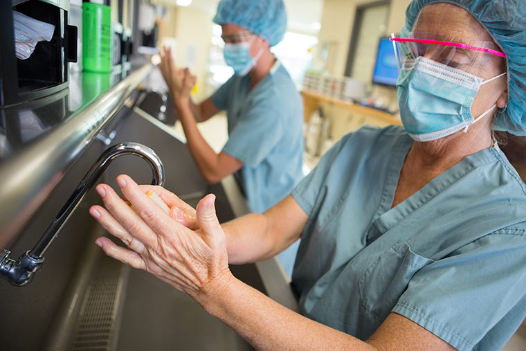 Doctors wash hands