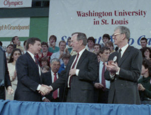 Then Sen. John Ashcroft (left) greets the president on his visit here Feb. 17, 1989, while then Chancellor William H. Danforth looks on.