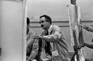 Arthur Osver (1912–2006) in Bixby Hall circa 1960. A new monograph edited by Angela Miller, professor of Art History & Archaeology in Arts & Sciences, is the first to trace the painter’s nearly seven-decade career. (Photo: Estate of Arthur Osver and Ernestine Betsberg)