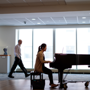 student plays piano