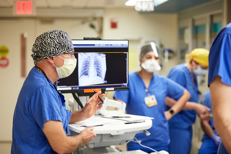 Frontline caregivers worked with COVID-19 positive patients at the 8400 level of Barnes-Jewish Hospital on May 1, 2020. (Photo: Matt Miller/Washington University School of Medicine)