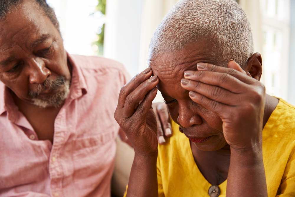 Senior,Man,Comforting,Woman,With,Depression,At,Home