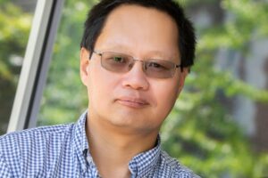 Headshot of Jianjun Guan