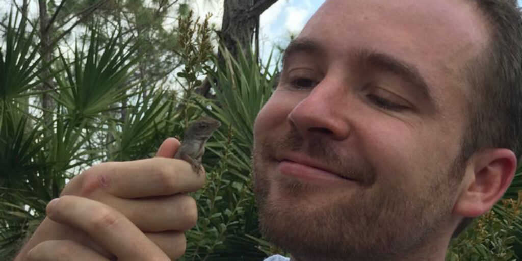 Dan Bock holding a lizard