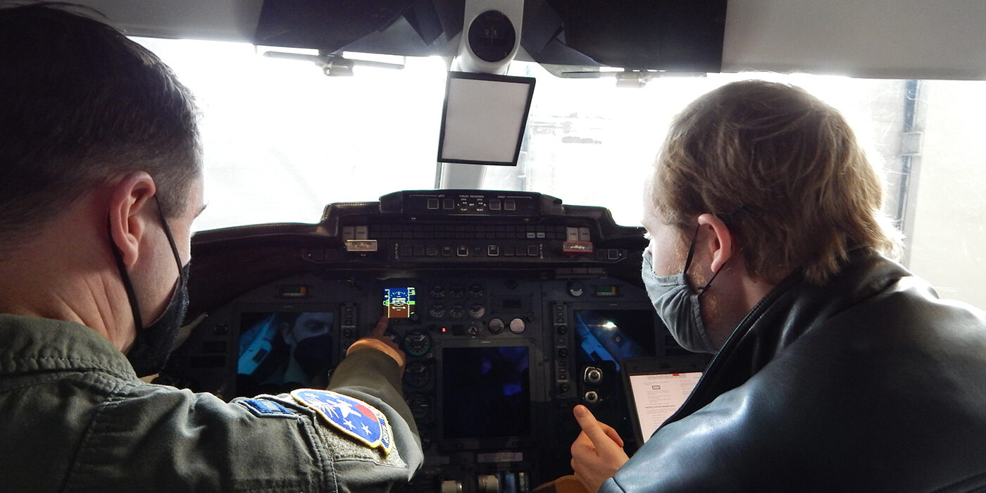 C-21 pilot Capt. Chandler Thorpe, 458th Airlift Squadron, and Washington University graduate student Kyle Gero go through a pre-flight checklist. Gero is a graduate student, who is collaborating with Scott’s Elevate innovation team and the squadron on a C-21 cockpit trainer project. The C-21 aircraft inventory went through an avionics upgrade in 2019, however, the training simulator uses the older cockpit configuration.