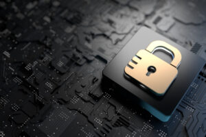 Image of a lock on a circuit board representing cybersecurity
