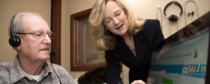 Nancy Tye-Murray, PhD, right, has developed training software to let patients with hearing loss practice listening to the voices they most want to hear. Tye-Murray helps Lonnie Willmann record audio clips for his wife, Kathleen Willmann, who has been diagnosed with hearing loss. Photo: Robert Boston