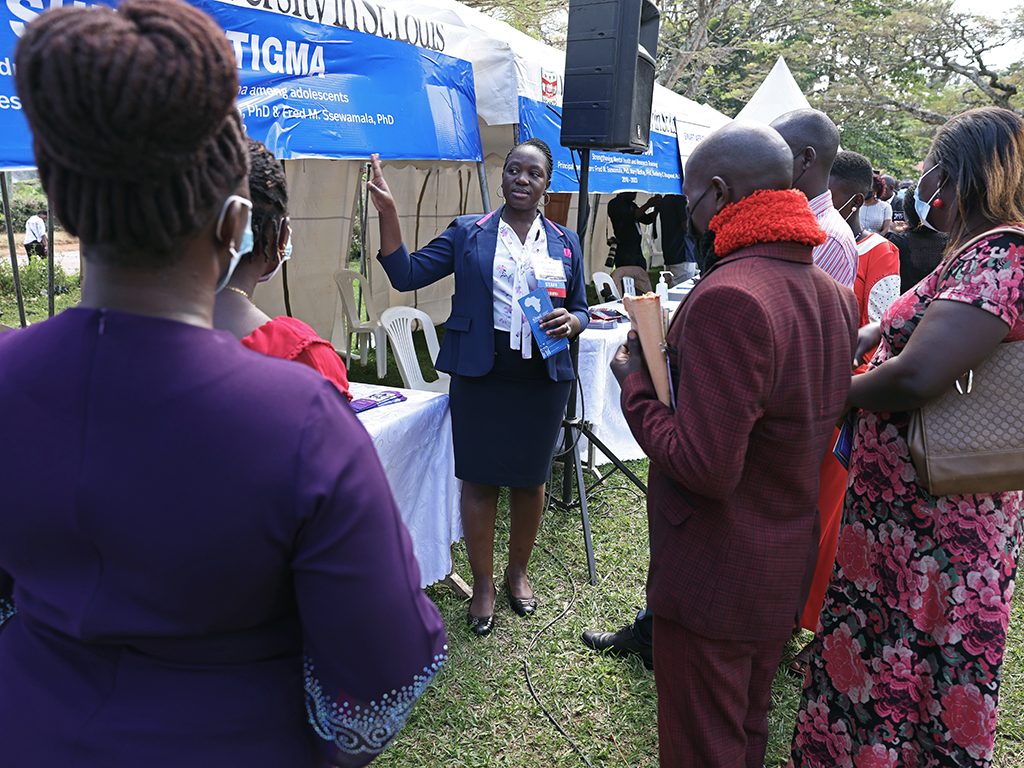 Proscovia Nabunya (center) was in her second year at Makerere University when she met Ssewamala. Now, she is co-director of the International Center for Child Health and Development (ICHAD). (Photo: Thomas Malkowicz/Washington University)