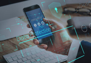 Image of cell phone and laptop with words "Data Protection" and "Privacy"