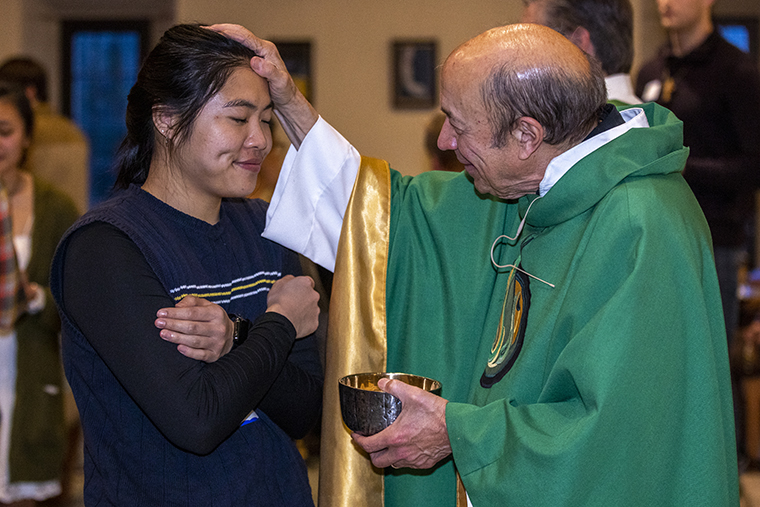 Father Gary celebrates mass on his 72nd birthday, near the Danforth Campus of Washington University in St. Louis.