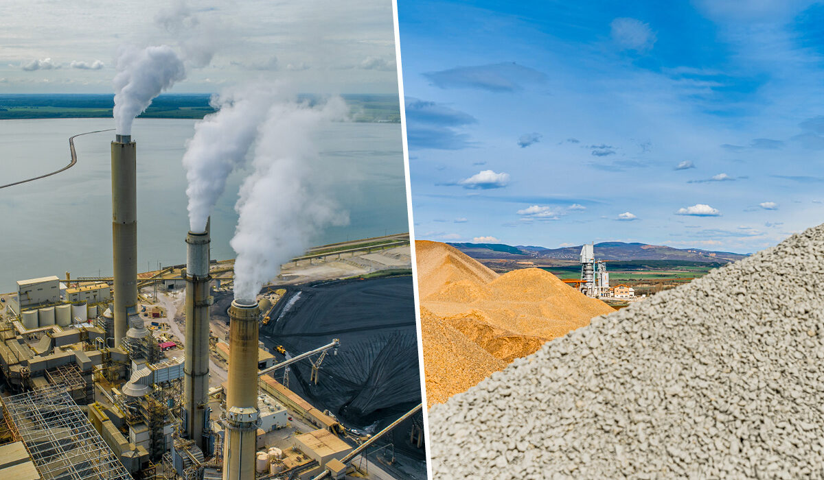 Power plant stacks with emitting smoke and pile of concrete