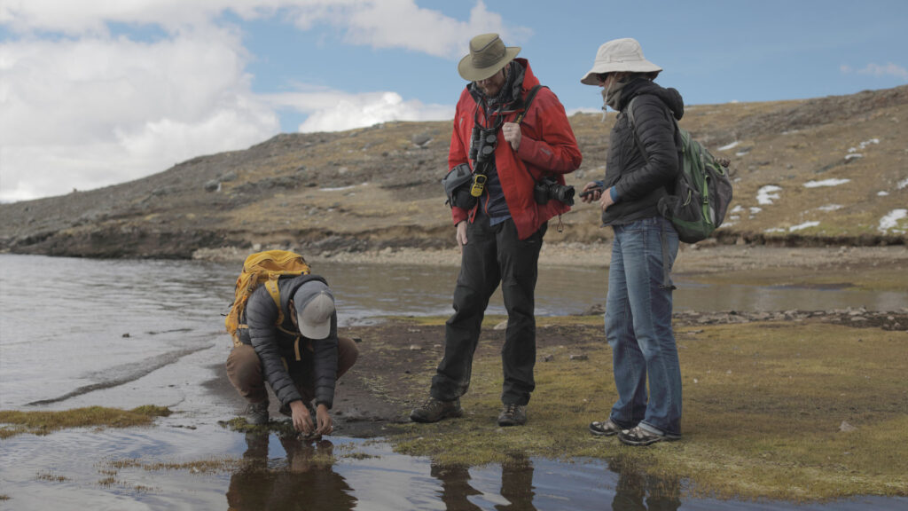 Sarah Baitzel, Assistant Professor Archeology, and Preston Sowell, President/Chief Executive officer Sibinacocha watershed project, inspect water and sediment.