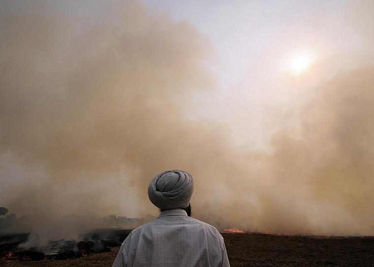 smoke above fires in India