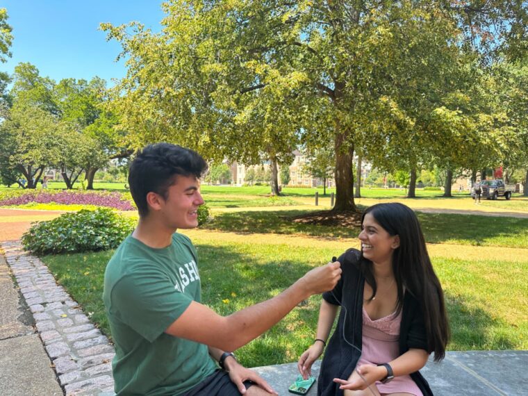 student Matteo Arshad interviews a classmate for a TikTok.