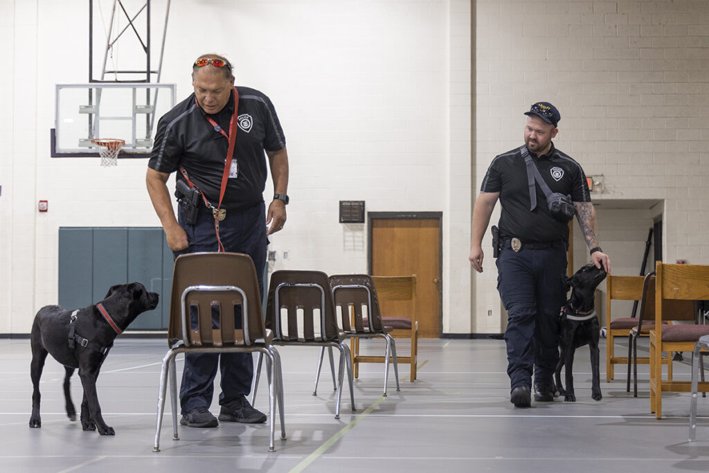 police officers with comfort dogs