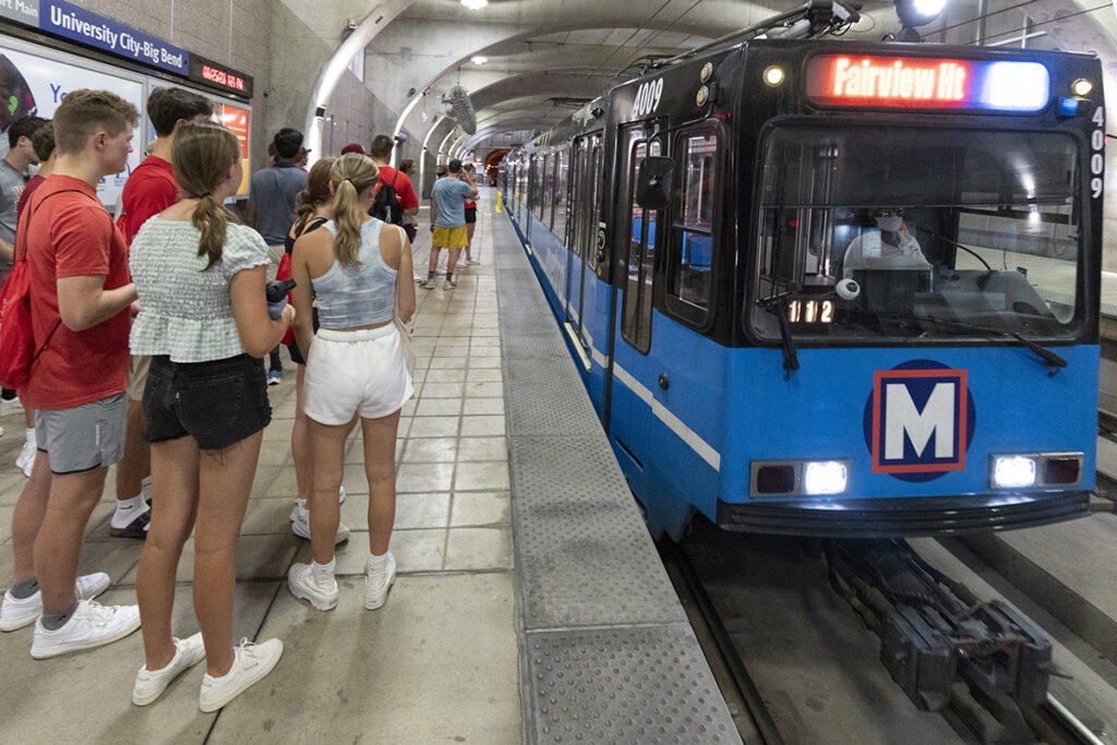 Washington University students take a Metro train ride