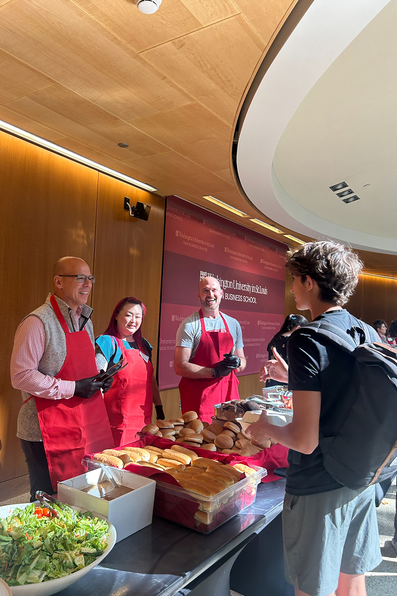 Olin dean Michael Mazzeo greets students