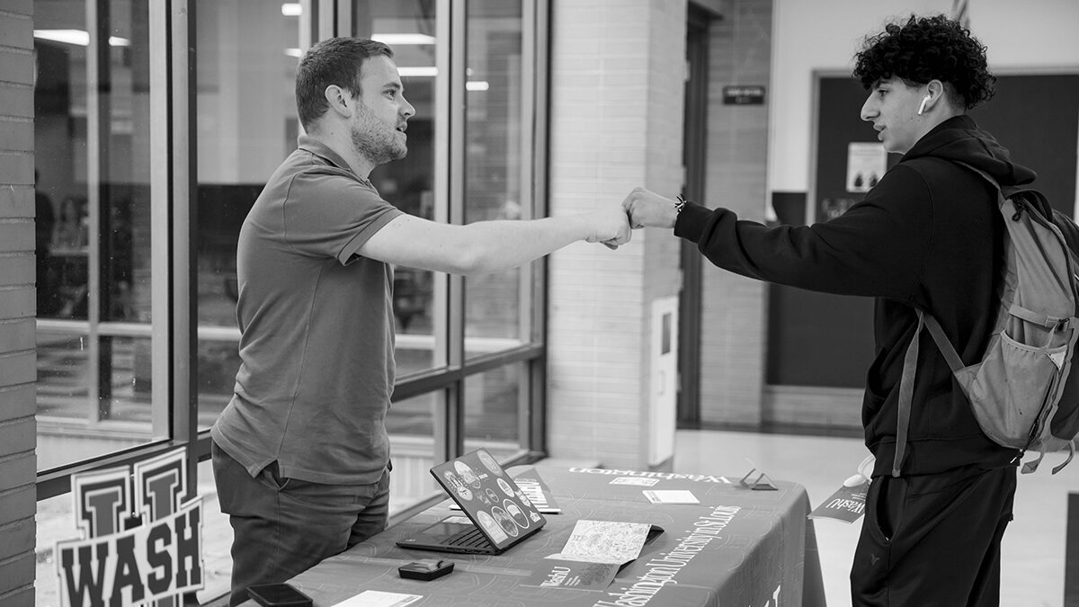 Dacoda Scarlett greets a high school student