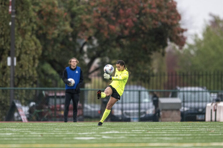 goalie Sidney Conner kicking a ball