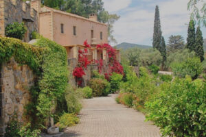 View of a country estate surrounded by garden.