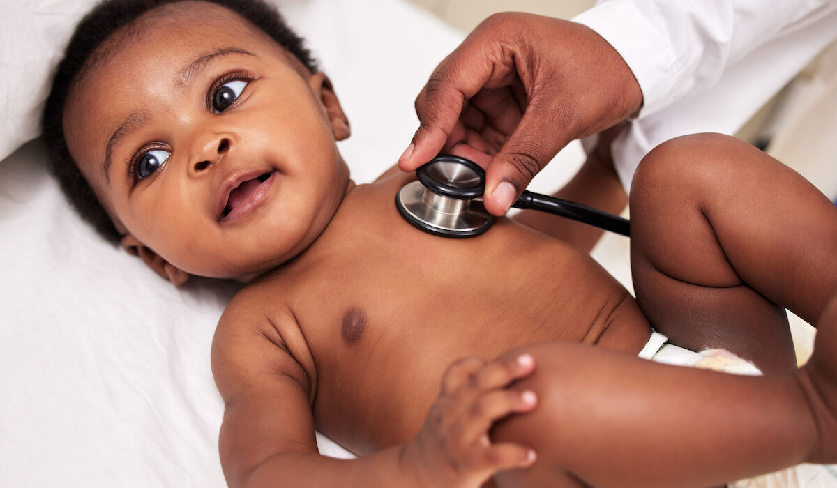 A little baby at a checkup with a doctor at a clinic