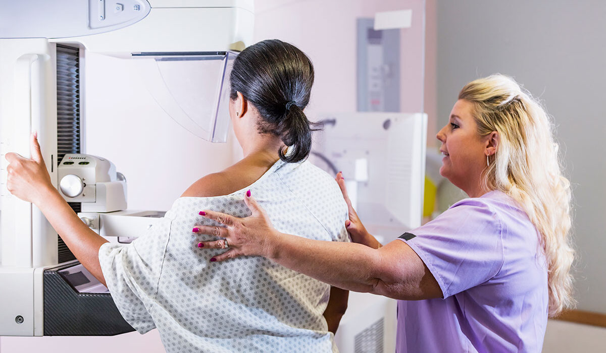 woman getting a mammogram