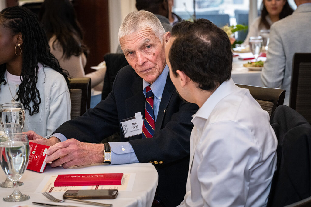 Bob Virgil talks to another attendee