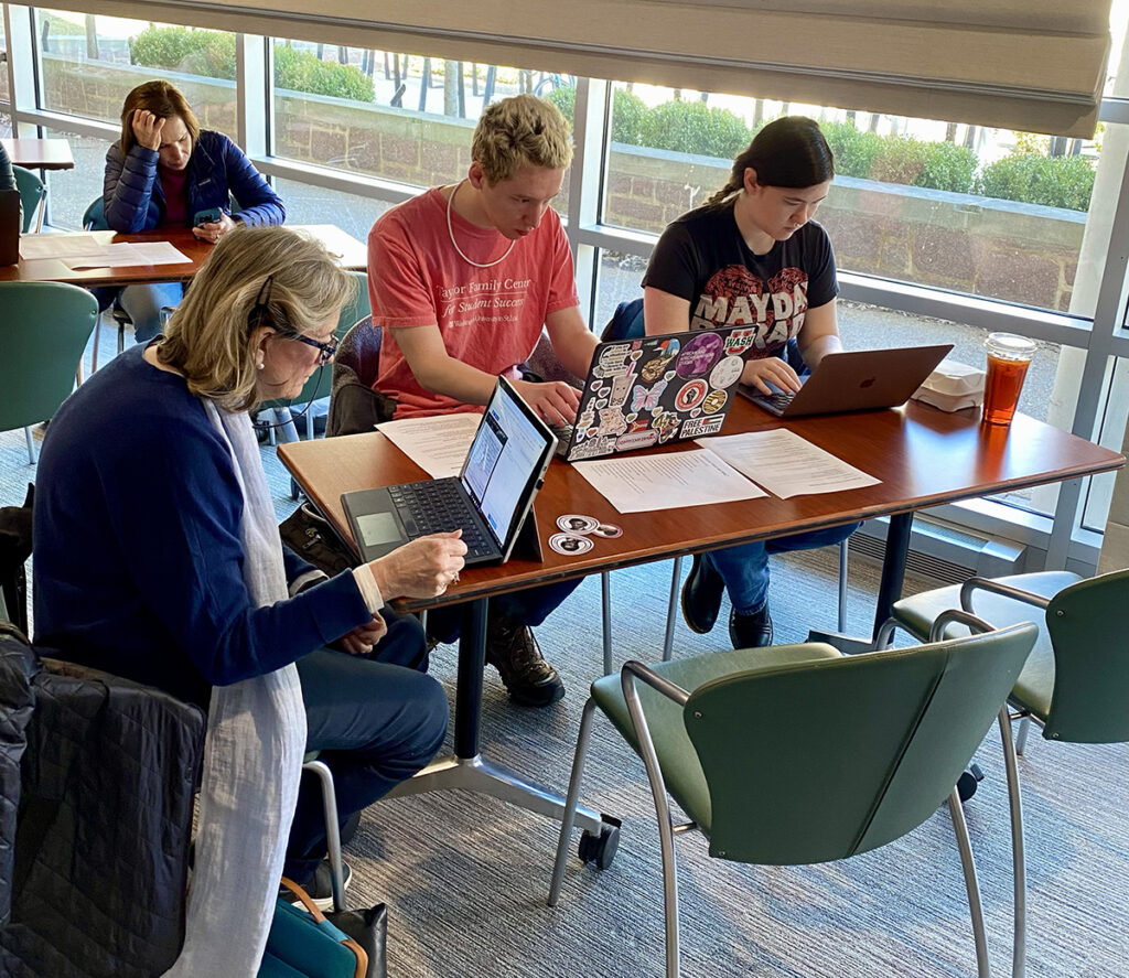 students work on their computers