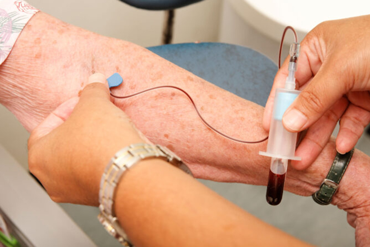 patient getting blood drawn