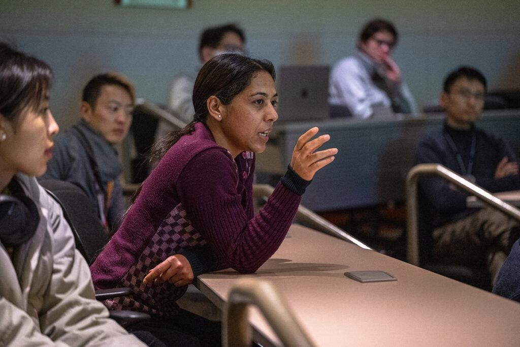 An attendee asks a question