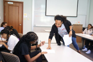 Seanna Leath with high school students