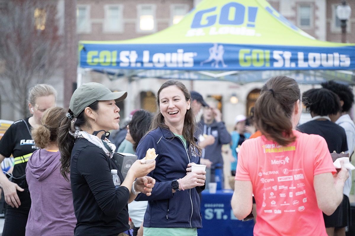 Runners celebrate with coffee and donuts