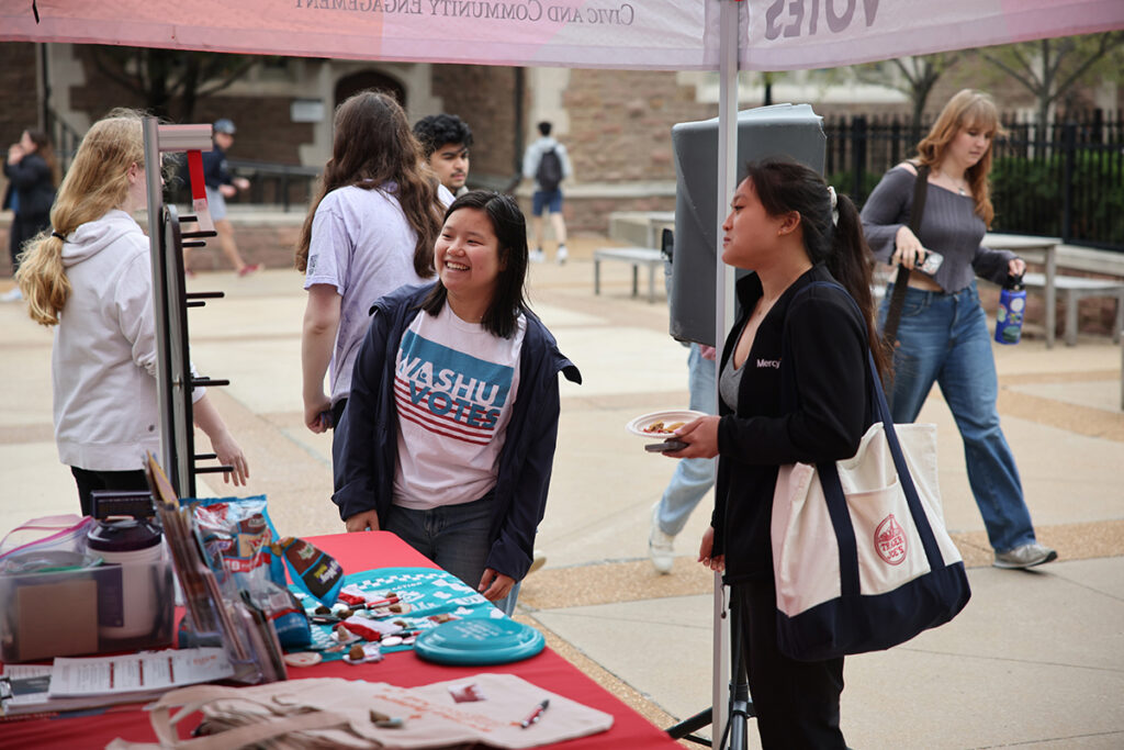 WashU Votes volunteers help voters at the polling place