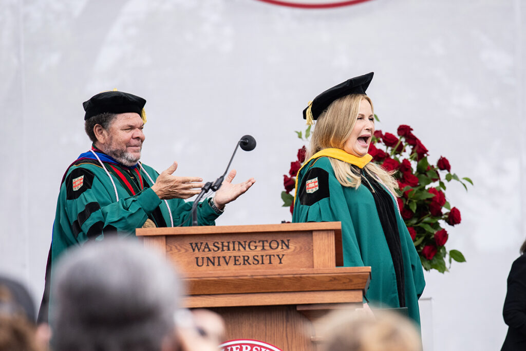 Jennifer Coolidge on stage during hooding ceremony