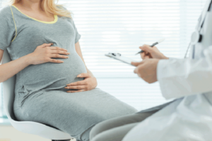 pregnant woman in doctor's office