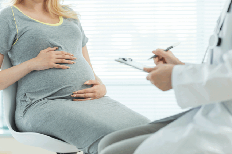 pregnant woman in doctor's office