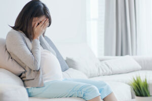 distressed pregnant woman