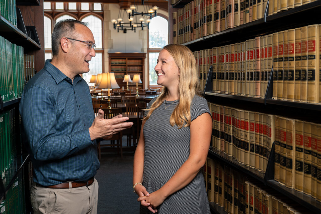 First Amendment expert John Inazu (left) mentors many students, including Caroline Kopsky, AB ’24, on freedoms of speech, assembly and religion. His most recent book discusses how all of us might learn to disagree and navigate differences with respect. (Photo: Sid Hastings/Washington University)