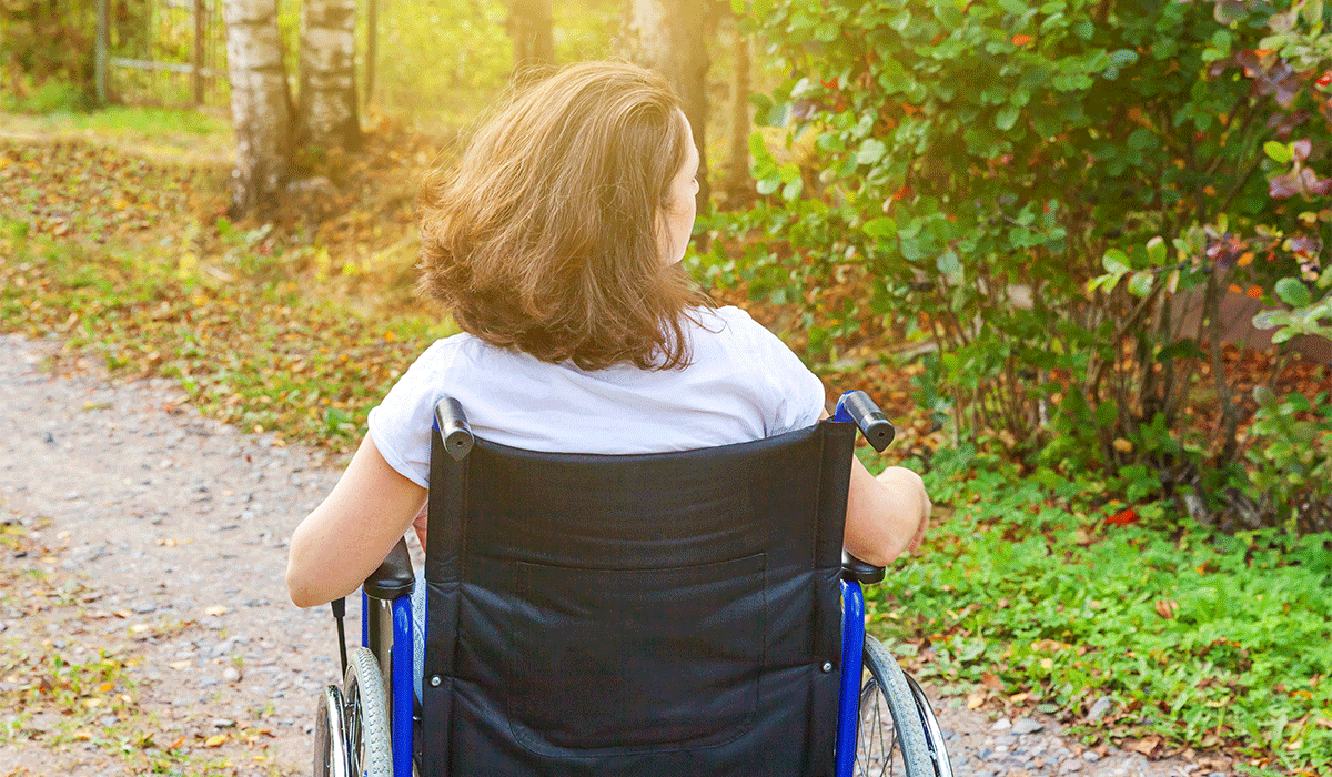 woman in wheelchair outside